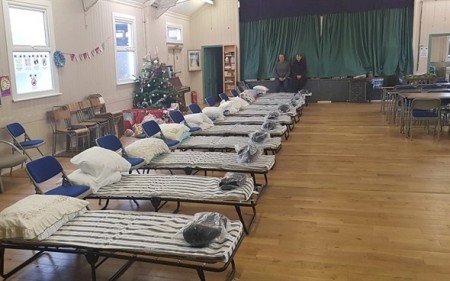 Ilkeston winter shelter, beds lined up in a hall