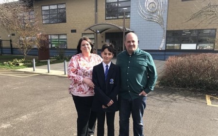 Jack stood with parents. From left to right is mum, Heidi Thompson, Jack Thompson and dad, Rob Thompson, all smiling. 