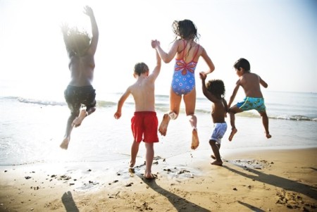 family jumping into the sea.jpeg